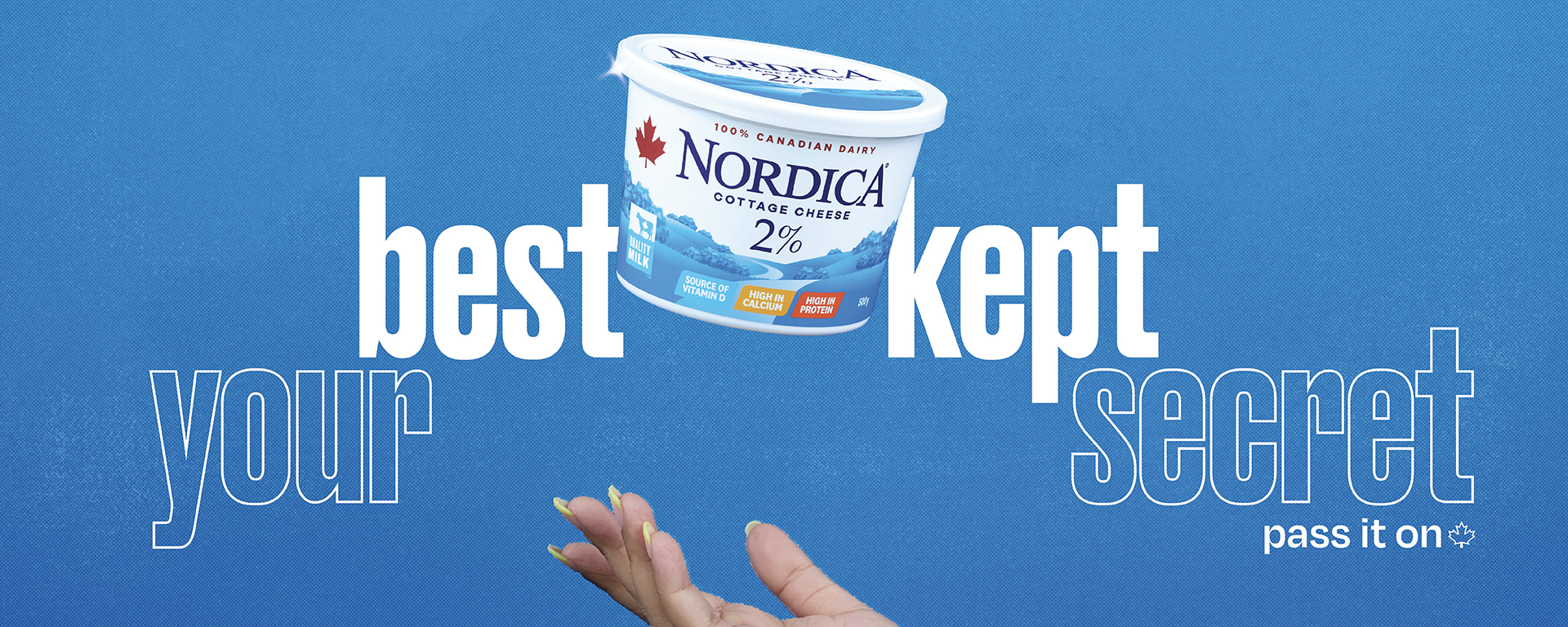 Hand tossing Nordica 2% cottage cheese in the air with the slogan "Your Best Kept Secret, pass it on"