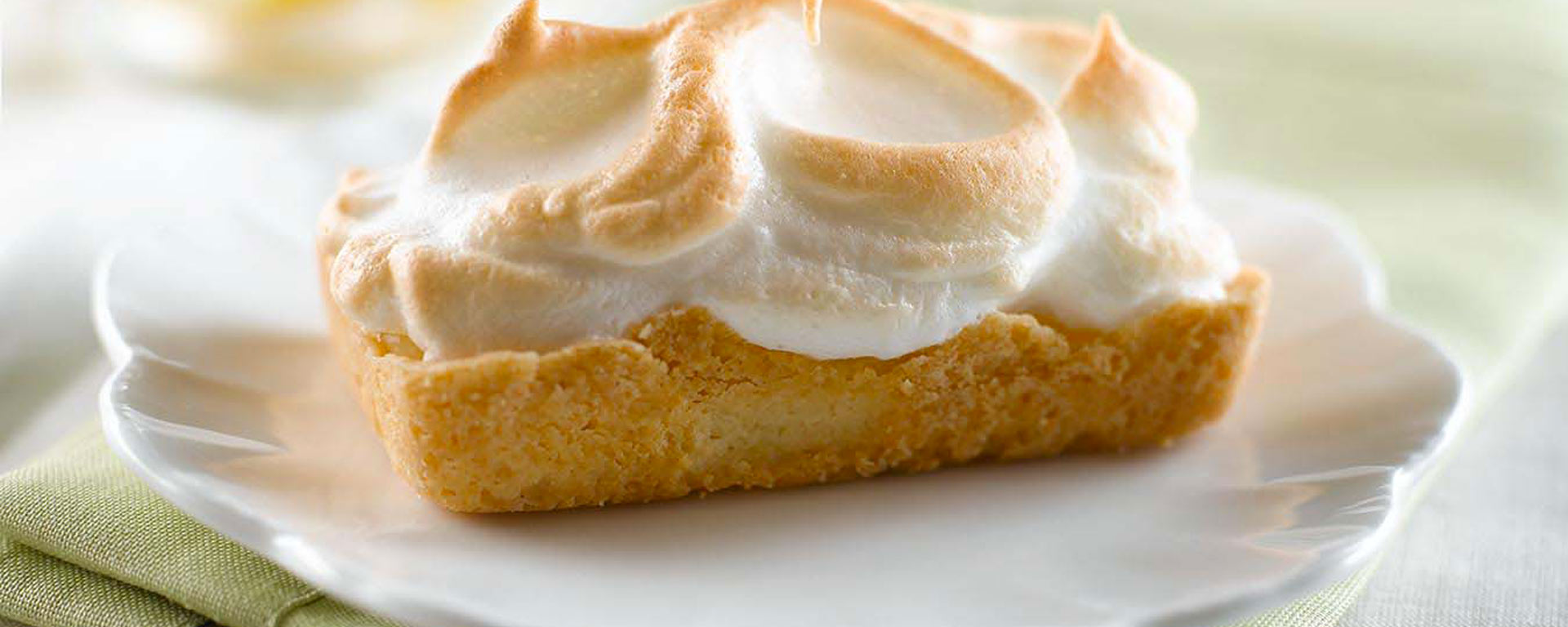 Photo of - Sour Cream Lemon Meringue Shortbread Tarts