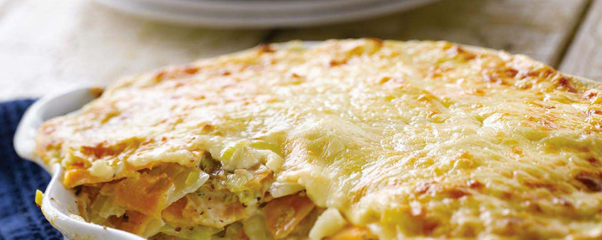 Photo of - Two Potato, Three Canadian Cheese Gratin
