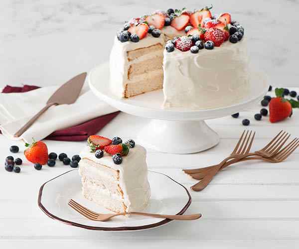 Photo of - Spiced Angel Food Cake with Sour Cream Frosting