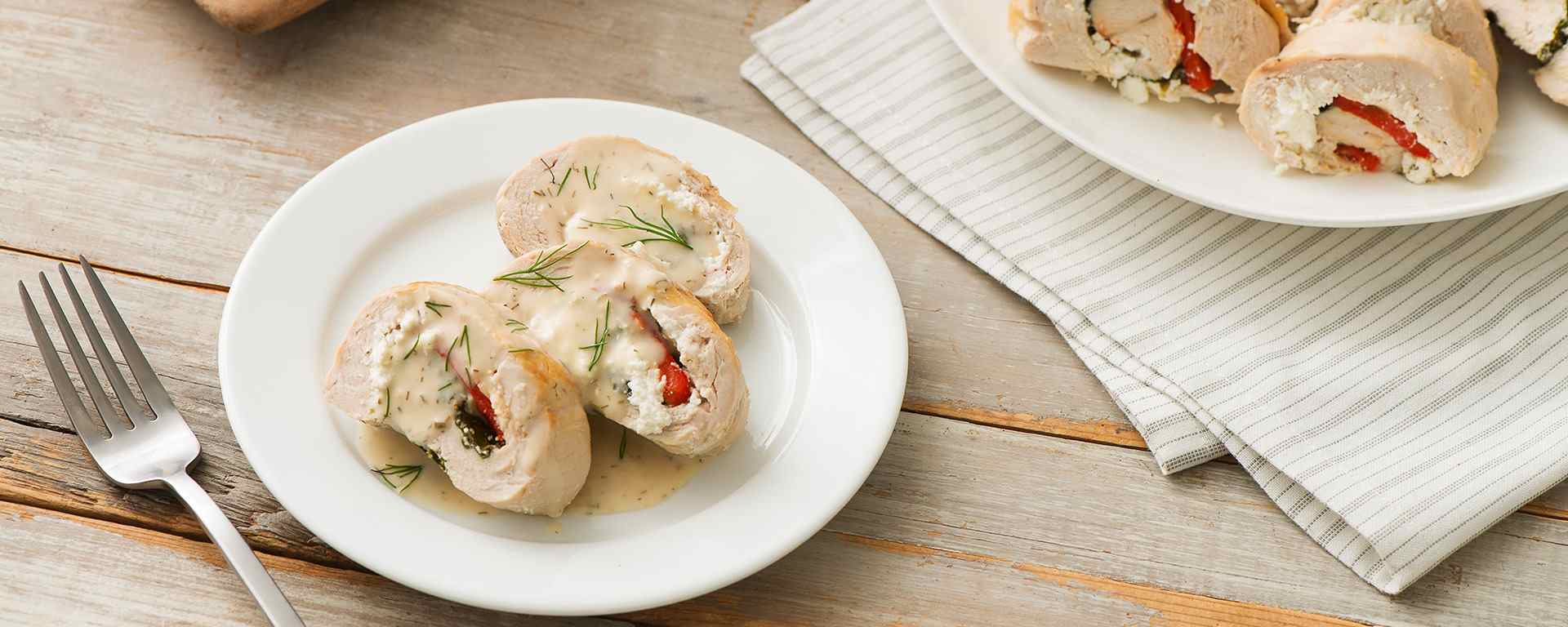 Photo of - Stuffed Chicken Breasts Poached in Lemon and Dill Butter