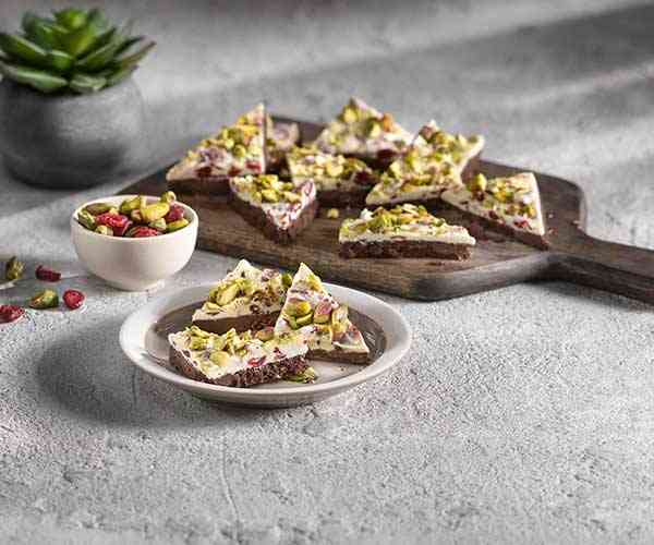 Photo of - No-Bake Chocolate Cranberry Pistachio Triangles